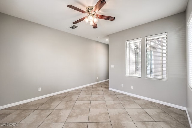 unfurnished room featuring ceiling fan, light tile patterned flooring, baseboards, and recessed lighting