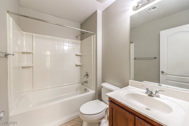 bathroom with toilet, vanity, shower / washtub combination, and tile patterned floors