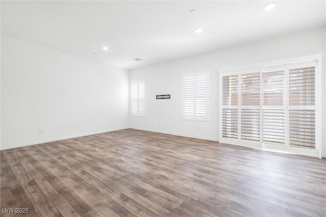 4125 Venus Falls Ave, North Las Vegas, NV 89084 - empty room with wood finished floors and recessed lighting