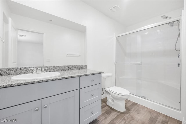 4125 Venus Falls Ave, North Las Vegas, NV 89084 - full bath featuring vanity, wood finished floors, and a shower stall