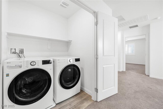 4125 Venus Falls Ave, North Las Vegas, NV 89084 - washroom featuring washer and dryer and light carpet