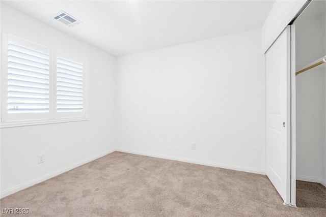 4125 Venus Falls Ave, North Las Vegas, NV 89084 - unfurnished bedroom featuring light carpet and a closet