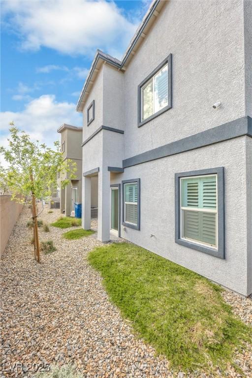 4125 Venus Falls Ave, North Las Vegas, NV 89084 - rear view of house featuring stucco siding