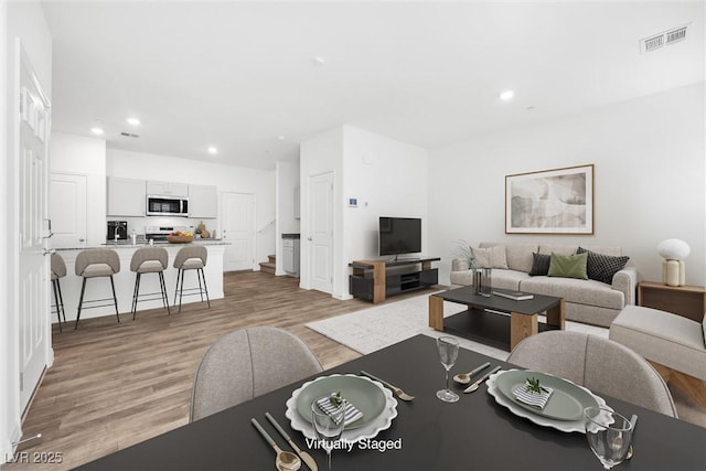 4125 Venus Falls Ave, North Las Vegas, NV 89084 - living room featuring light wood-style floors and recessed lighting
