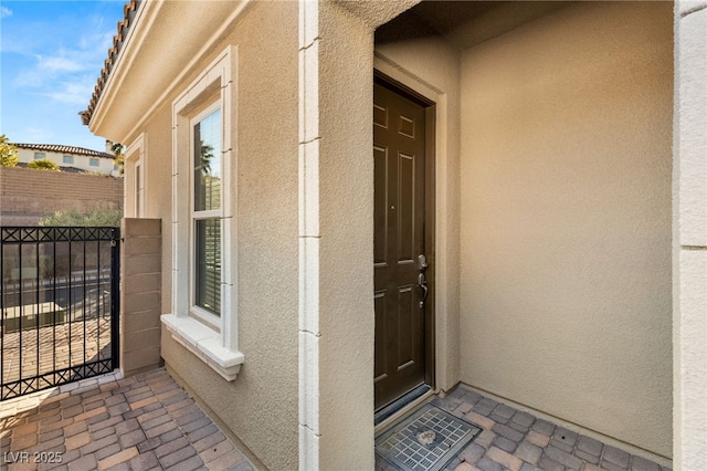 50 Carolina Cherry Dr, Las Vegas, NV 89141 - property entrance with stucco siding