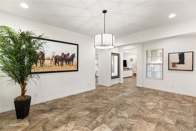 50 Carolina Cherry Dr, Las Vegas, NV 89141 - unfurnished dining area with stone finish flooring and recessed lighting
