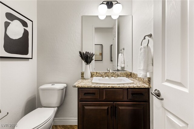 50 Carolina Cherry Dr, Las Vegas, NV 89141 - bathroom featuring toilet and vanity