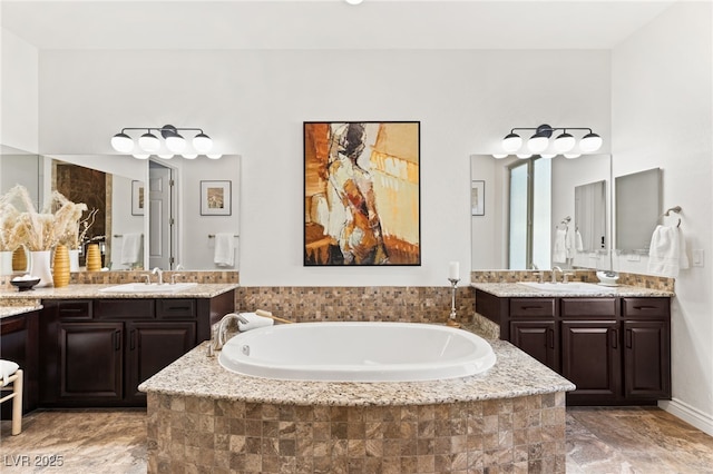 50 Carolina Cherry Dr, Las Vegas, NV 89141 - full bathroom featuring two vanities and a bath