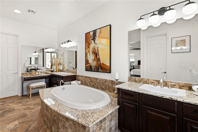 50 Carolina Cherry Dr, Las Vegas, NV 89141 - ensuite bathroom with a garden tub and two vanities