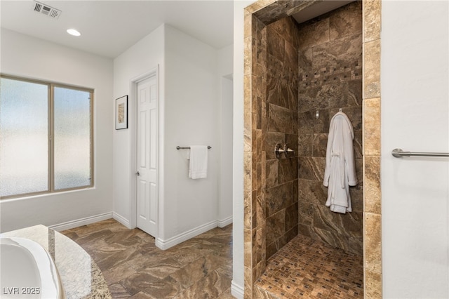 50 Carolina Cherry Dr, Las Vegas, NV 89141 - bathroom featuring tiled shower, vanity, and marble finish flooring