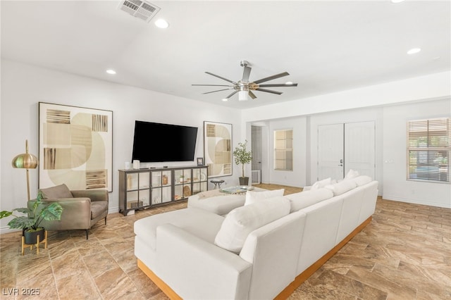 50 Carolina Cherry Dr, Las Vegas, NV 89141 - living room with light stone finish flooring, ceiling fan, and recessed lighting