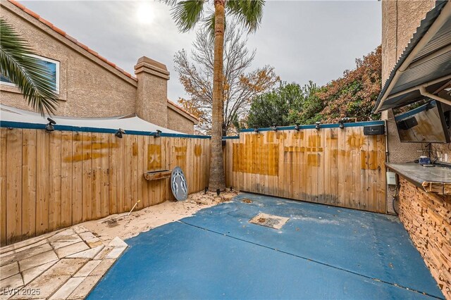 view of patio with fence