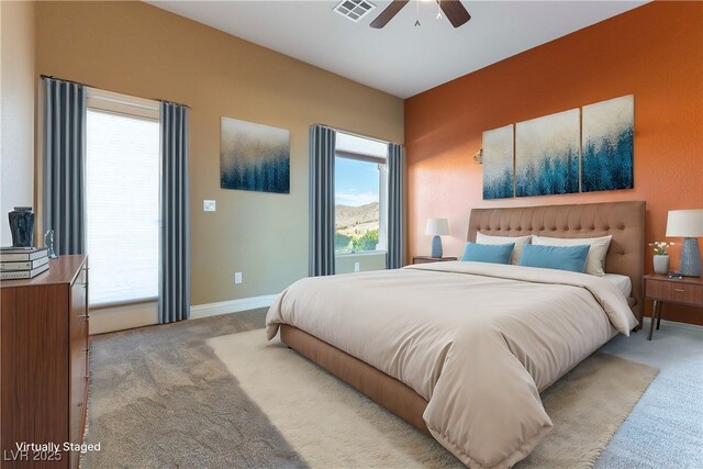 380 Claremont St, Boulder City, NV 89005 - bedroom featuring ceiling fan, light carpet, visible vents, and baseboards