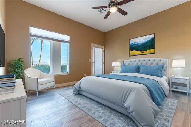 380 Claremont St, Boulder City, NV 89005 - bedroom with baseboards, light wood-style flooring, visible vents, and a ceiling fan