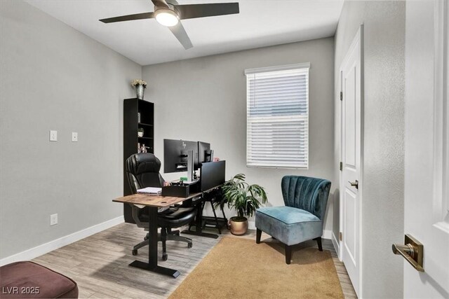 office with ceiling fan, wood finished floors, and baseboards