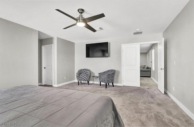 bedroom featuring visible vents, baseboards, a ceiling fan, and carpet floors