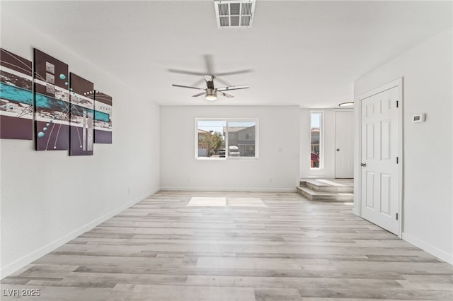 2915 Cedar Ave Unit 12C, Las Vegas, NV 89101 - spare room with ceiling fan, visible vents, baseboards, and wood finished floors