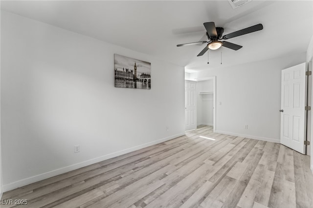 2915 Cedar Ave Unit 12C, Las Vegas, NV 89101 - unfurnished bedroom with a ceiling fan, visible vents, baseboards, and light wood-type flooring