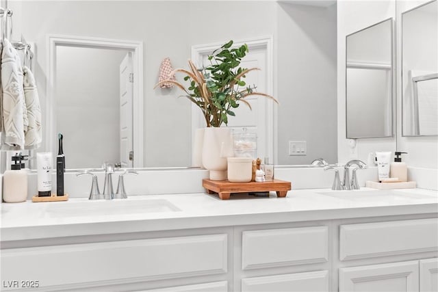 bathroom with double vanity