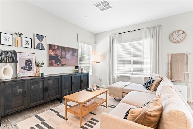 living area with wood tiled floors