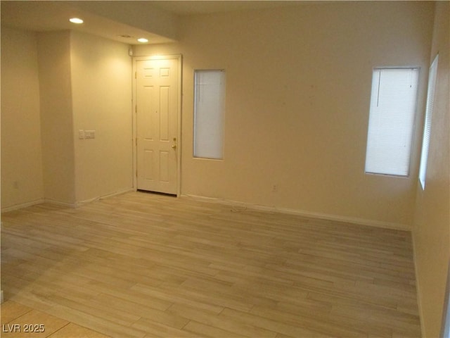 5481 Railroad River Ave, Las Vegas, NV 89139 - spare room featuring light wood-style floors, baseboards, and recessed lighting
