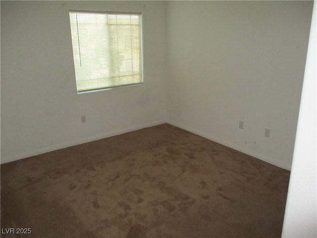 5481 Railroad River Ave, Las Vegas, NV 89139 - empty room featuring carpet flooring and baseboards