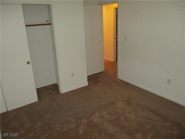 5481 Railroad River Ave, Las Vegas, NV 89139 - unfurnished bedroom with carpet flooring, a closet, and baseboards