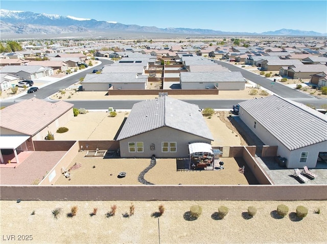 bird's eye view featuring a mountain view and a residential view