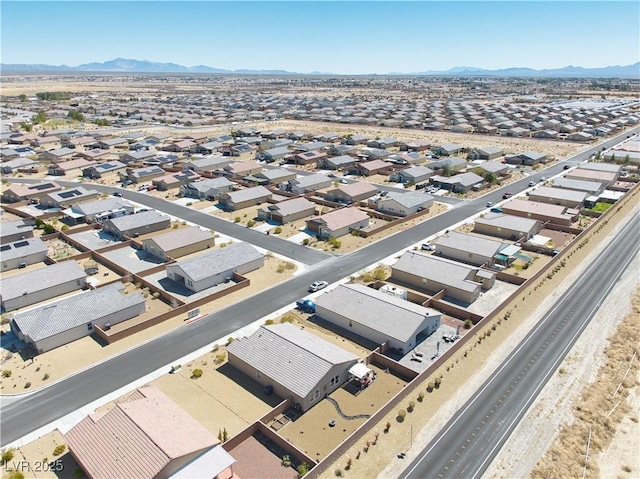 aerial view featuring a residential view and a mountain view
