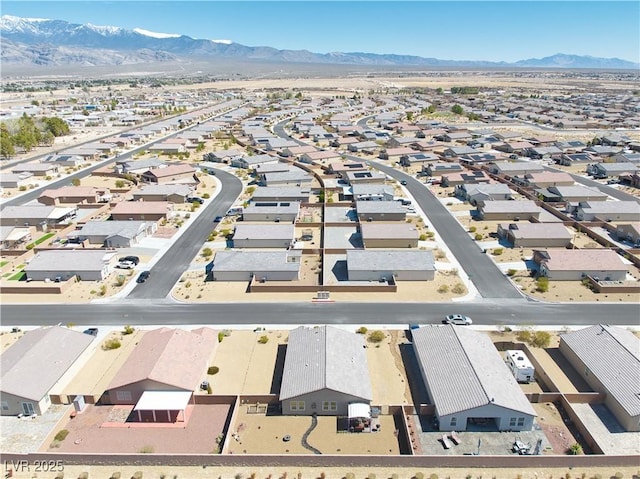 aerial view with a mountain view and a residential view