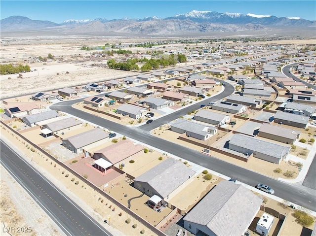 aerial view with a mountain view and a residential view