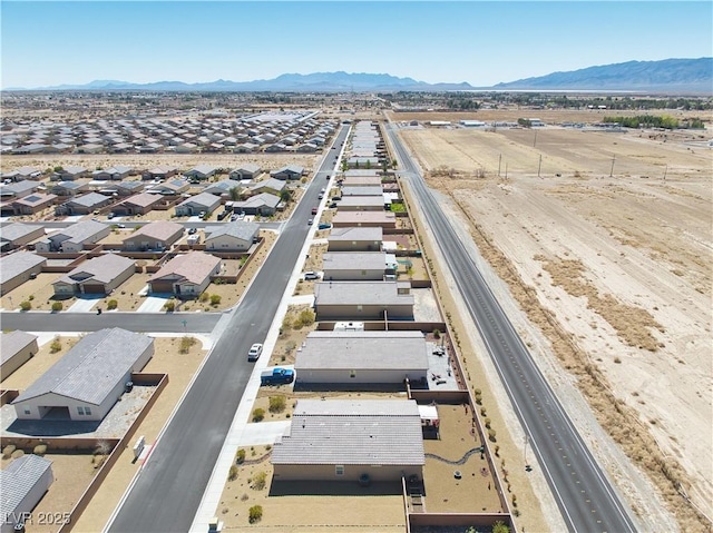 bird's eye view with a mountain view and a residential view
