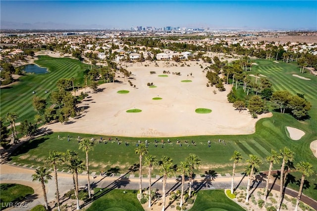 aerial view featuring a water view and golf course view