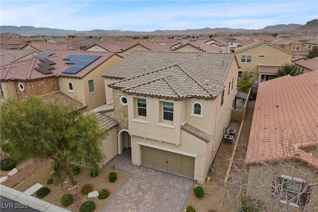 bird's eye view with a mountain view and a residential view