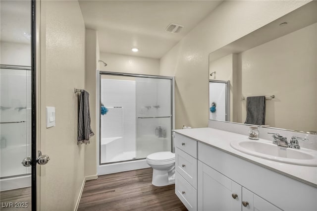 3725 Celesta Vista Ave, Henderson, NV 89044 - full bath with a shower stall, wood finished floors, toilet, and vanity