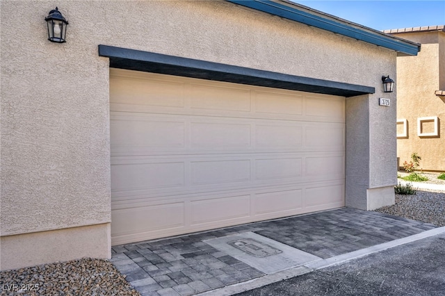 3725 Celesta Vista Ave, Henderson, NV 89044 - garage featuring decorative driveway