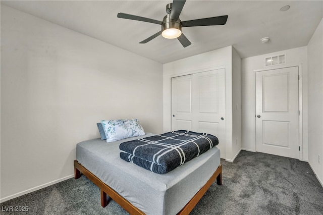 3725 Celesta Vista Ave, Henderson, NV 89044 - bedroom featuring dark colored carpet, baseboards, a closet, and ceiling fan