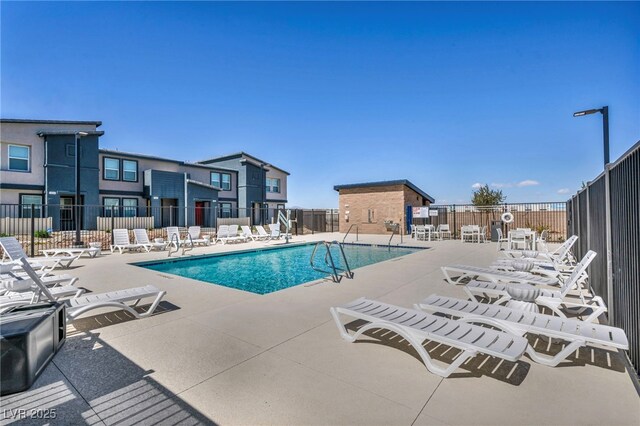 3725 Celesta Vista Ave, Henderson, NV 89044 - community pool with fence and a patio area