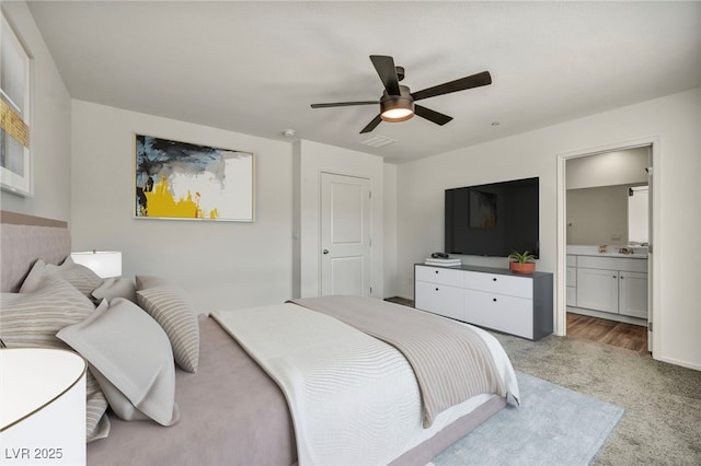 3725 Celesta Vista Ave, Henderson, NV 89044 - bedroom featuring carpet, ensuite bath, a ceiling fan, and a sink