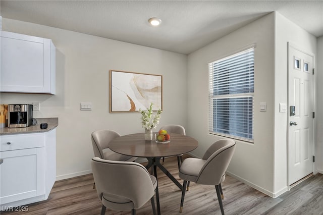 3725 Celesta Vista Ave, Henderson, NV 89044 - dining area featuring wood finished floors and baseboards