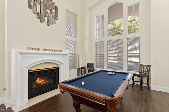 9517 Spanish Steps Ln, Las Vegas, NV 89117 - rec room featuring billiards, plenty of natural light, a high ceiling, and baseboards