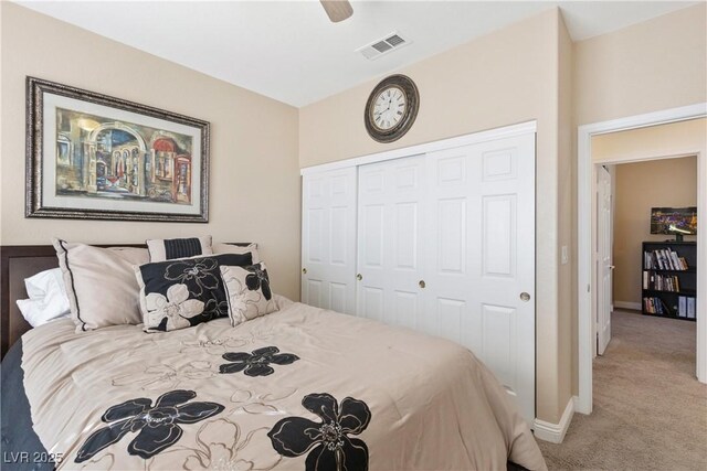9517 Spanish Steps Ln, Las Vegas, NV 89117 - bedroom featuring light carpet, a closet, baseboards, and ceiling fan