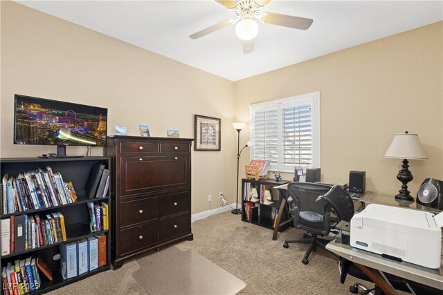 9517 Spanish Steps Ln, Las Vegas, NV 89117 - office featuring ceiling fan, light carpet, and baseboards
