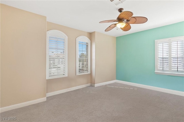 9517 Spanish Steps Ln, Las Vegas, NV 89117 - carpeted spare room featuring a ceiling fan and baseboards