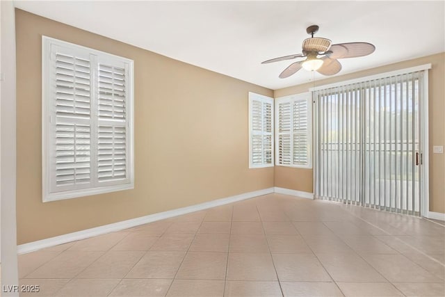 9517 Spanish Steps Ln, Las Vegas, NV 89117 - tiled empty room featuring baseboards and a ceiling fan