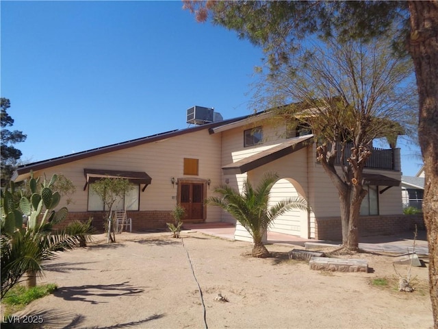 3127 Aloha Ave, Las Vegas, NV 89121 - view of front of property with cooling unit and a balcony