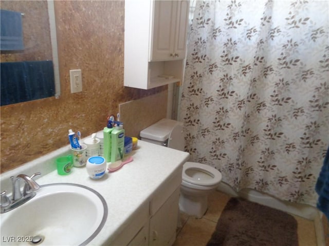3127 Aloha Ave, Las Vegas, NV 89121 - bathroom with vanity, tile patterned floors, toilet, and a shower with shower curtain