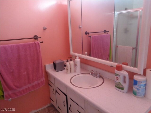 3127 Aloha Ave, Las Vegas, NV 89121 - bathroom featuring vanity and a shower stall