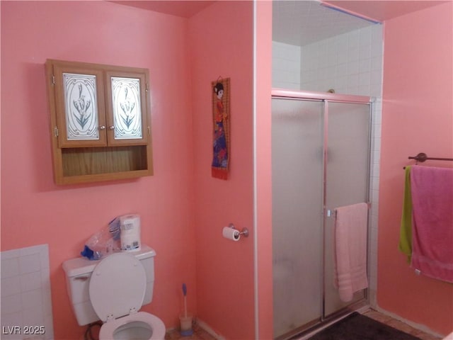 3127 Aloha Ave, Las Vegas, NV 89121 - full bathroom with a stall shower and toilet