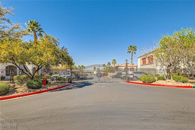 950 Seven Hills Dr Unit 814, Henderson, NV 89052 - view of street featuring a gate, a gated entry, and curbs